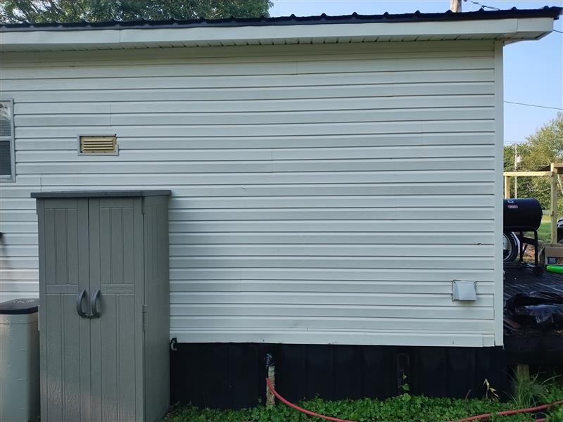 White siding after soft washing